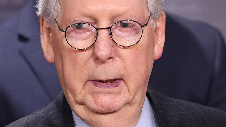 Mitch McConnell before a press conference 