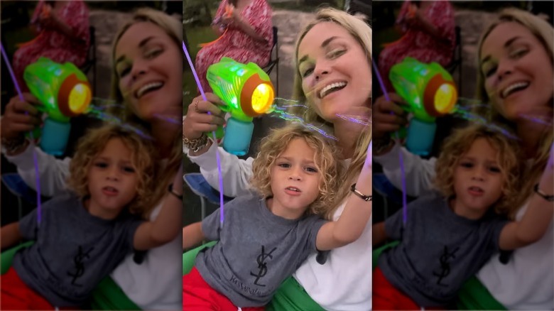 Kelly Hughes with her son