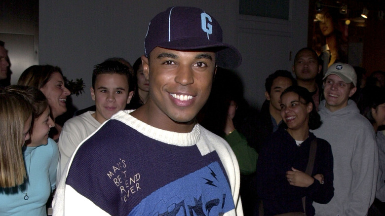 Merlin Santana smiling at the 2001 WB Network All Star party