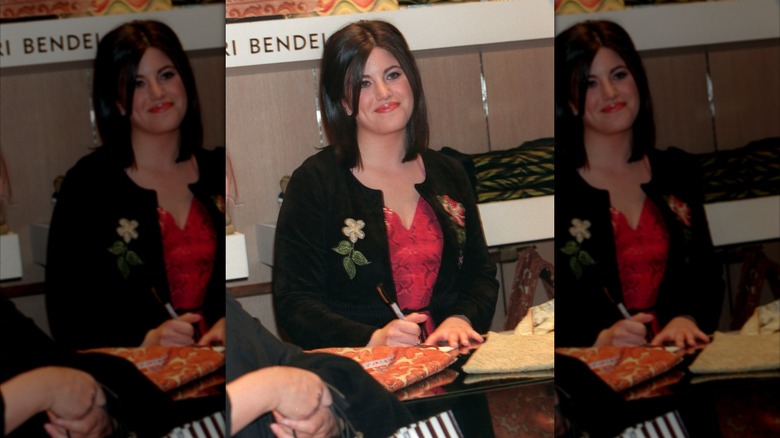 Monica Lewinsky smiling at Henri Bendel's on Fifth Avenue in 2000