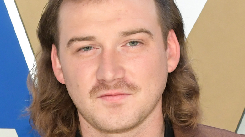 Morgan Wallen in brown suit