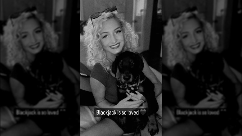 Moriah Plath holding a puppy