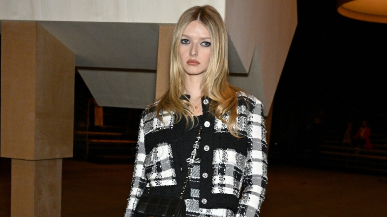 Apple Martin attending a fashion show.