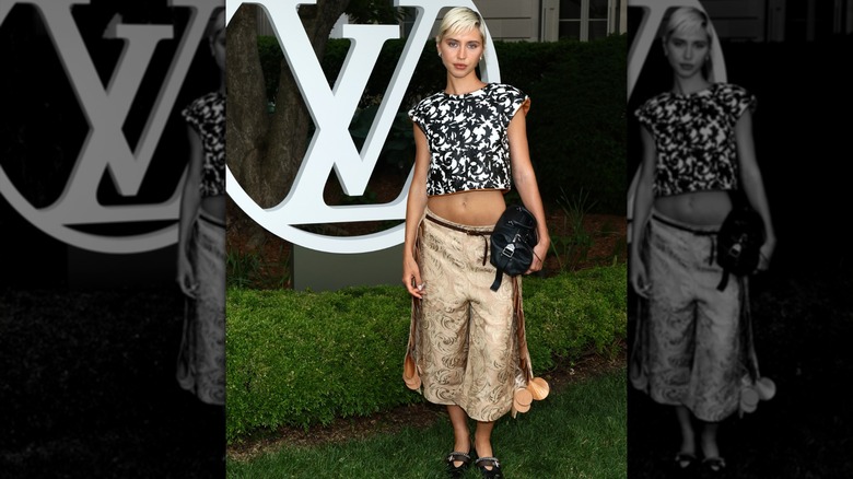 Iris Law attends the Louis Vuitton Cruise 2027 show
