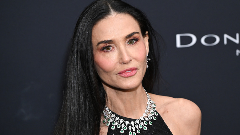 Demi Moore poses on the red carpet