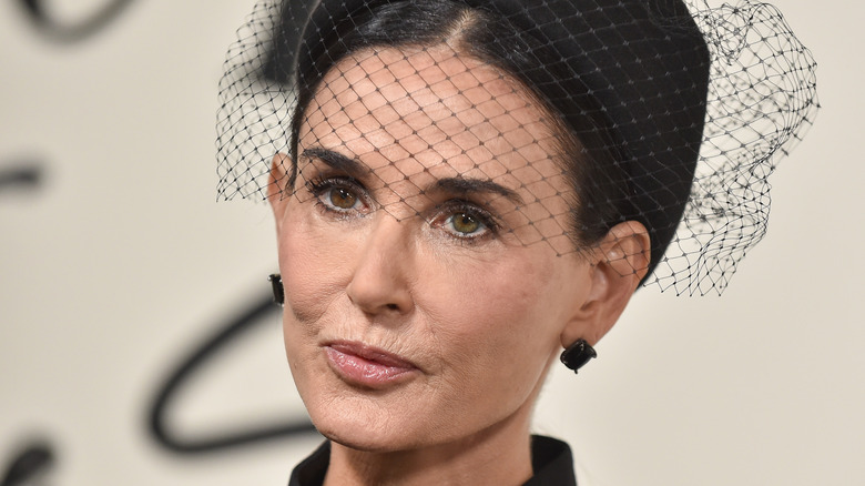 Demi Moore wearing a hat