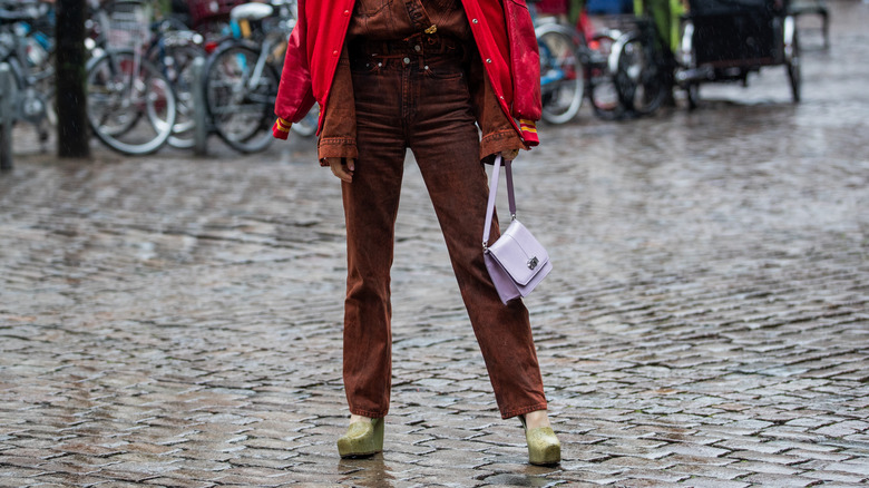 Woman wearing brown jeans