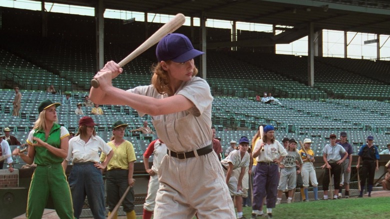 Geena Davis holds bat