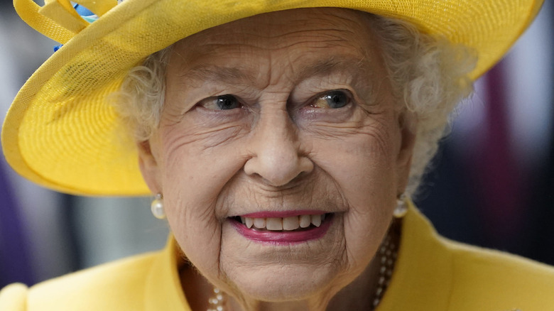 Queen Elizabeth yellow hat