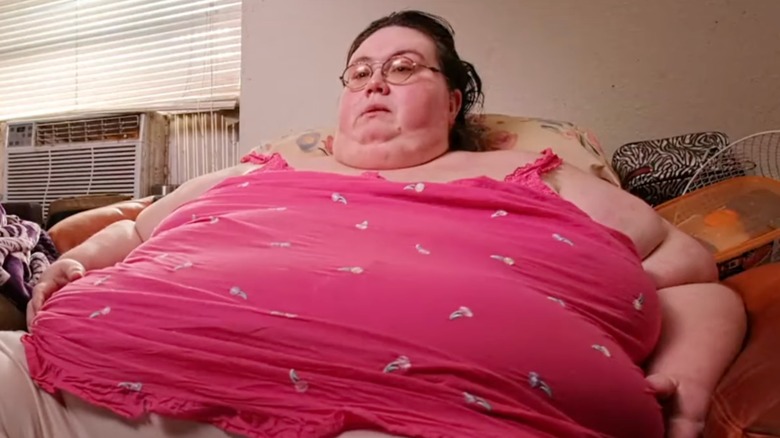 Jeanne Covey sitting on couch during an episode of "My 600-lb Life"