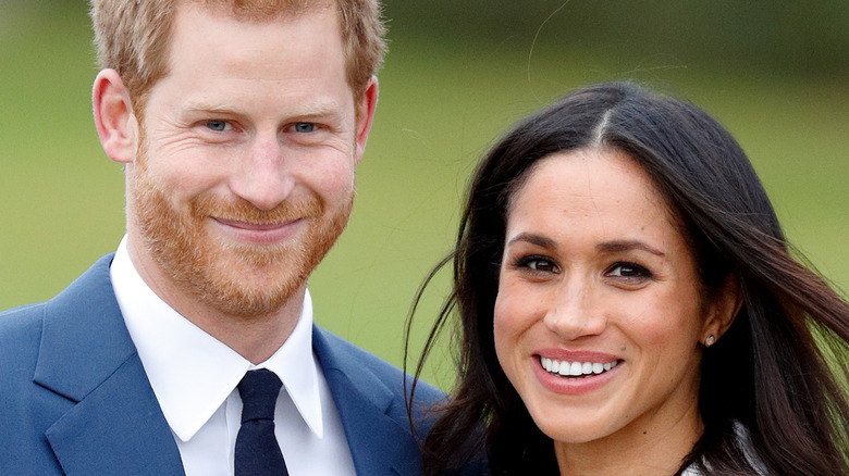 Meghan and Harry taking engagement photos