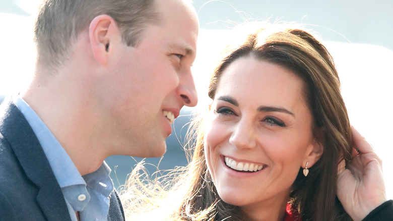 Kate Middleton and Prince William waving