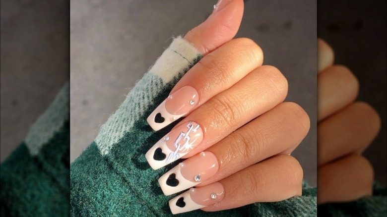 heart punched nails