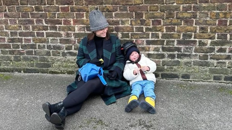 An image of Princess Eugenie and her son August sitting side by side