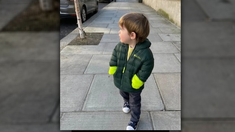 An image of Princess Eugenie's son Ernest walking on a street