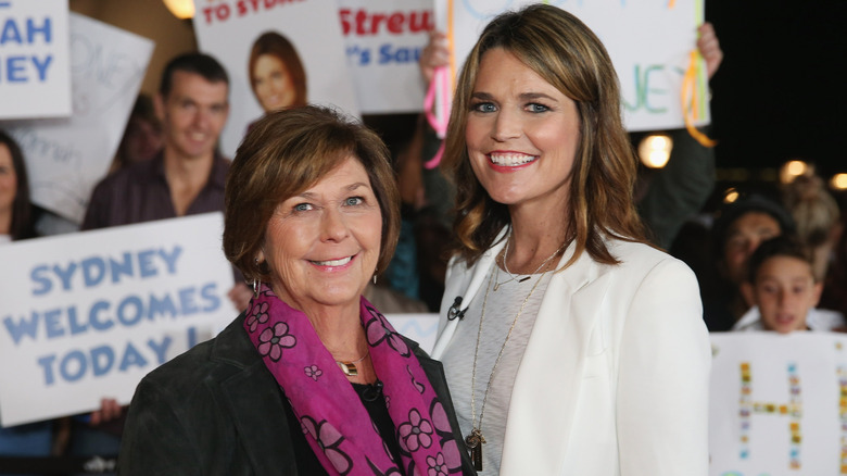 Nancy Guthrie and Savannah Guthrie smiling for cameras in front of a crowd