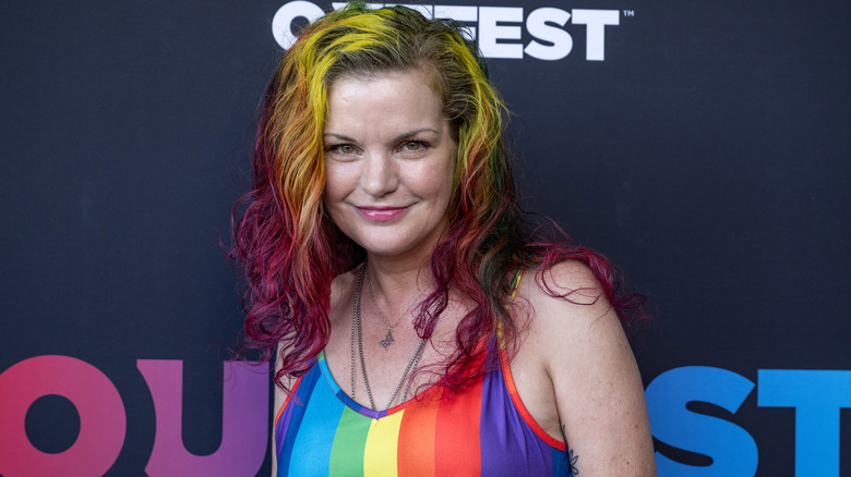 Pauley Perrette wearing rainbow top