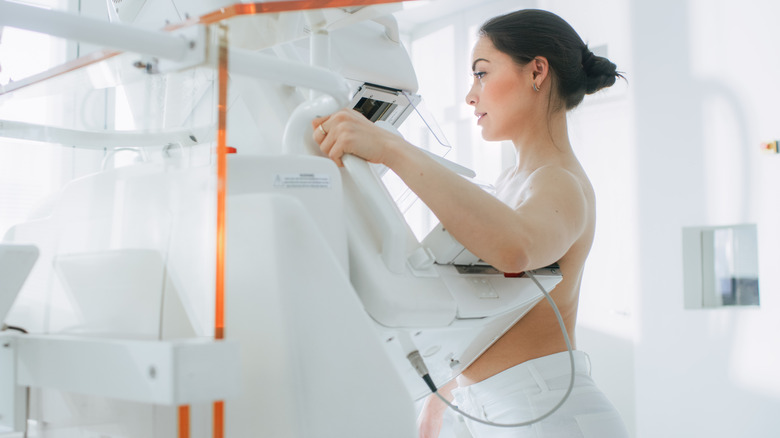 Woman receives a mammogram