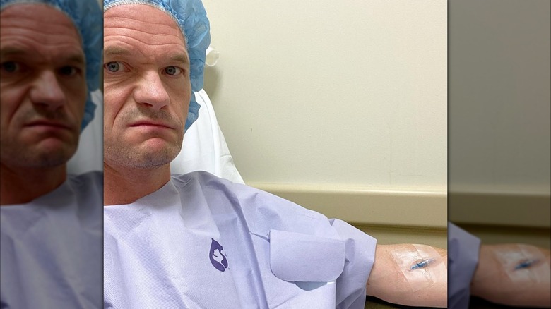 NPH takes a selfie at the hospital after an operation on his hand