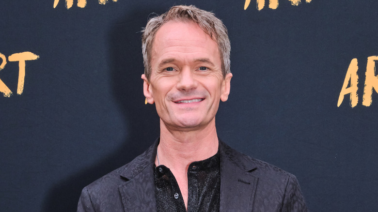 Neil Patrick Harris smiles on a 2025 red carpet.