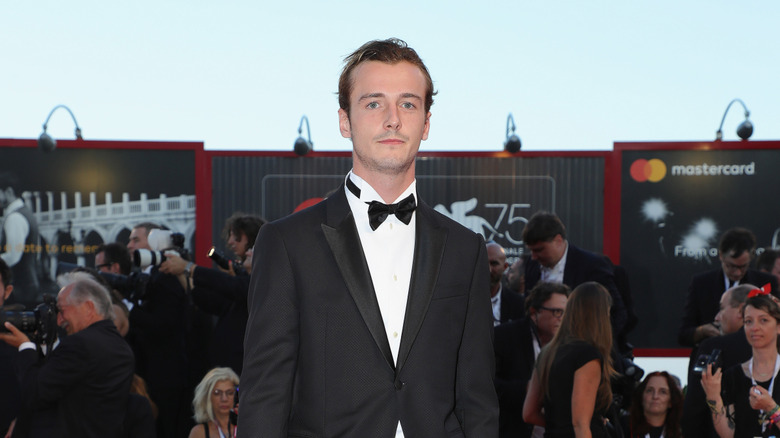 Micheál Richardson in a black tux and bowtie
