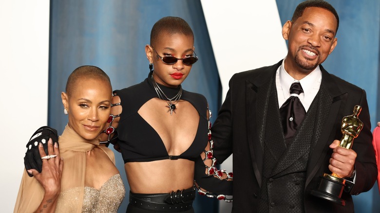 Jada Pinkett Smith, Willow Smith, and Will Smith at the Oscars after Will won