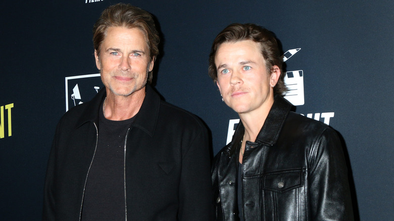 John Owen Lowe in black jacket with dad Rob Lowe