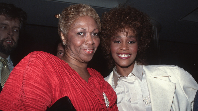 Whitney Houston and Cissy Houston smiling while posing for photos together