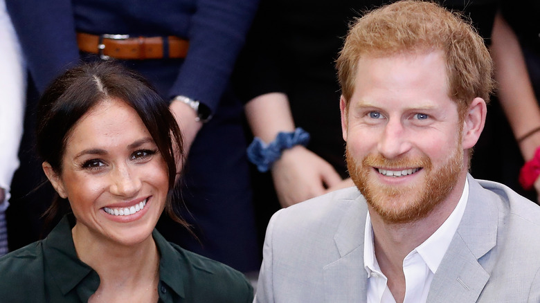 Prince Harry and Meghan Markle smiling