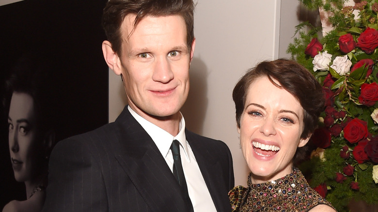 Matt Smith and Claire Foy posing