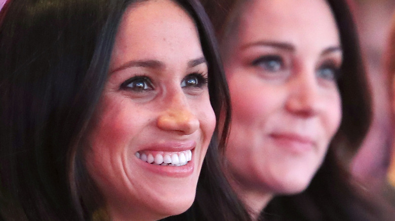 Kate Middleton & Meghan Markle smiling