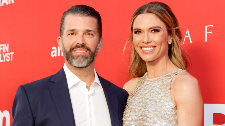 Donald Trump Jr. and Bettina Anderson posing