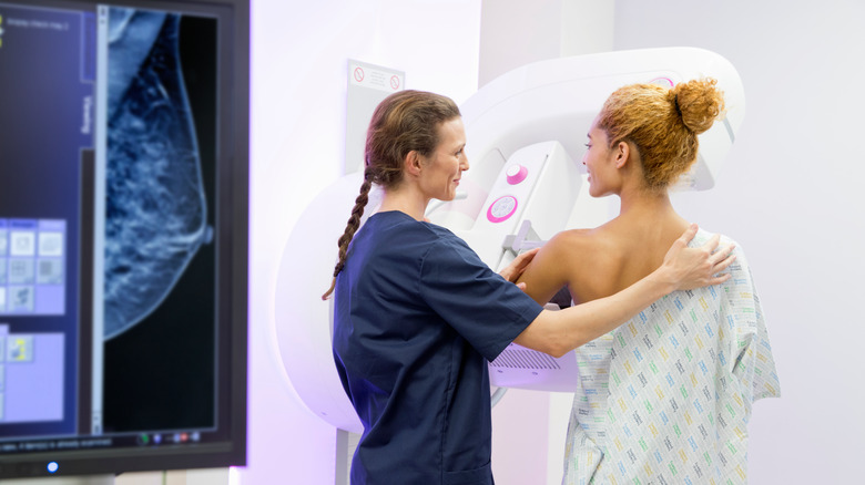 woman getting mammogram