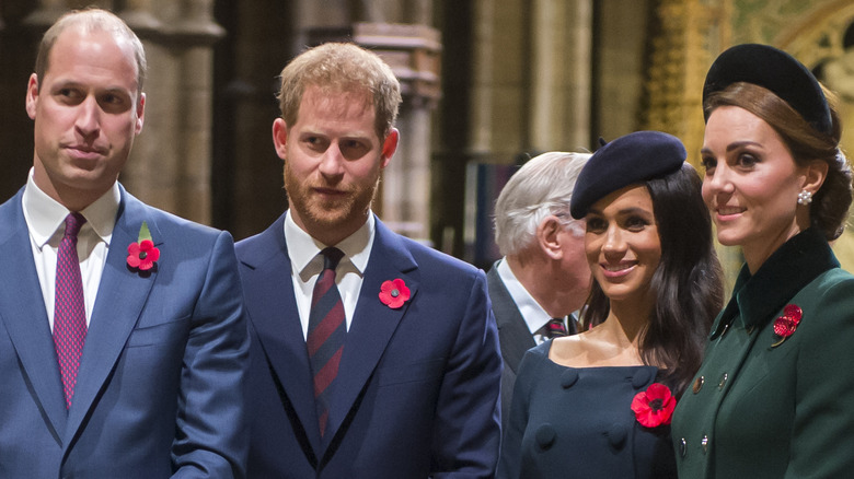 Prince William, Prince Harry, Meghan Markle, and Kate Middleton standing together