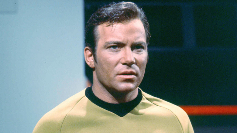 William Shatner in costume as Captain Kirk on the set of 'Star Trek'