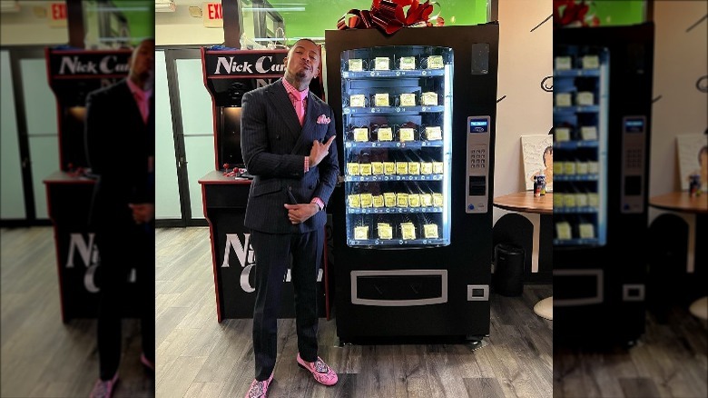 Nick Cannon poses with his Valentine's Day gift