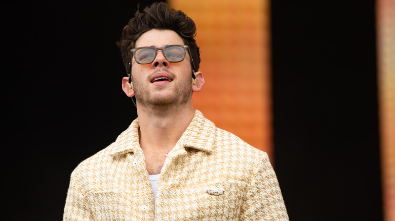 Nick Jonas performing onstage