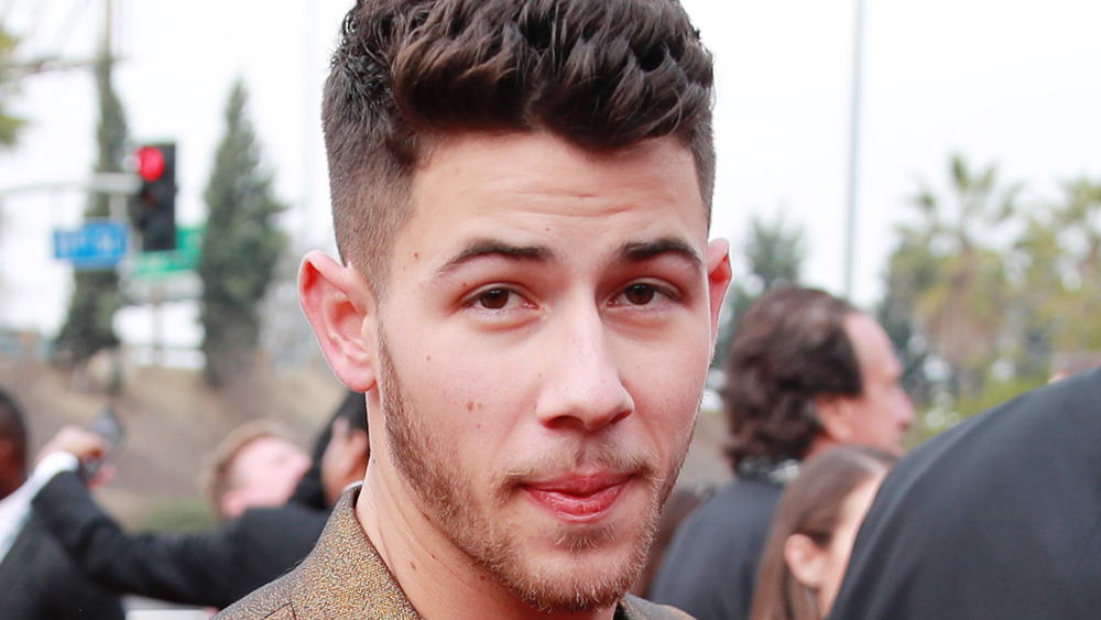 Nick Jonas outdoors at event