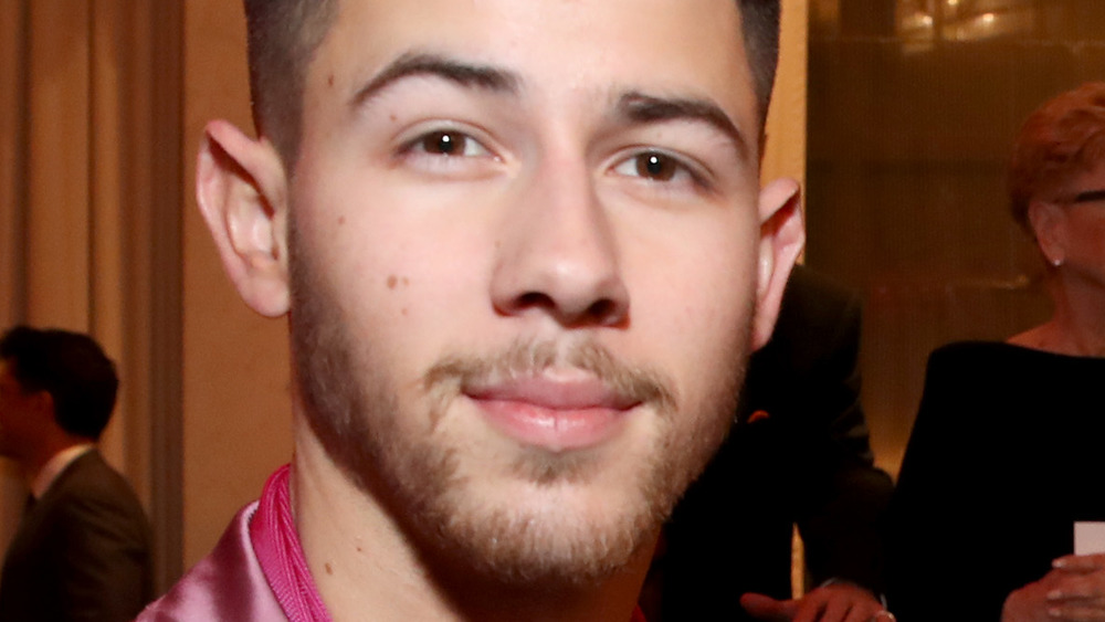 Nick Jonas smiling