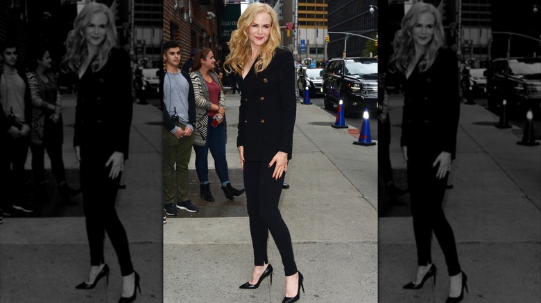 Nicole Kidman pictured in New York City wearing a double-breasted black jacket, black skinny jeans, and high black heels