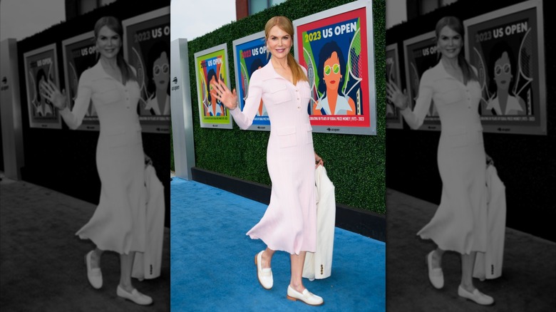 Nicole Kidman pictured arriving at Coco Gauff and Aryna Sabalenka's 2023 US Open tennis match, wearing a pink dress and sunglasses