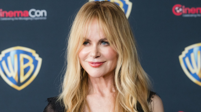 Nicole Kidman smiling while posing at CinemaCon