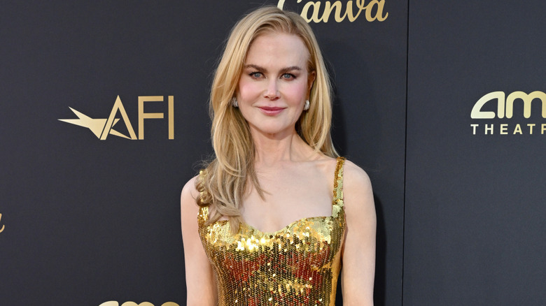 Nicole Kidman wearing a gold gown
