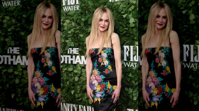 Nicole Kidman with blonde hair in a floral dress at the Gotham Awards.