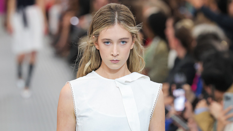 Sunday Rose walking for Miu Miu at 2024 Paris Fashion Week