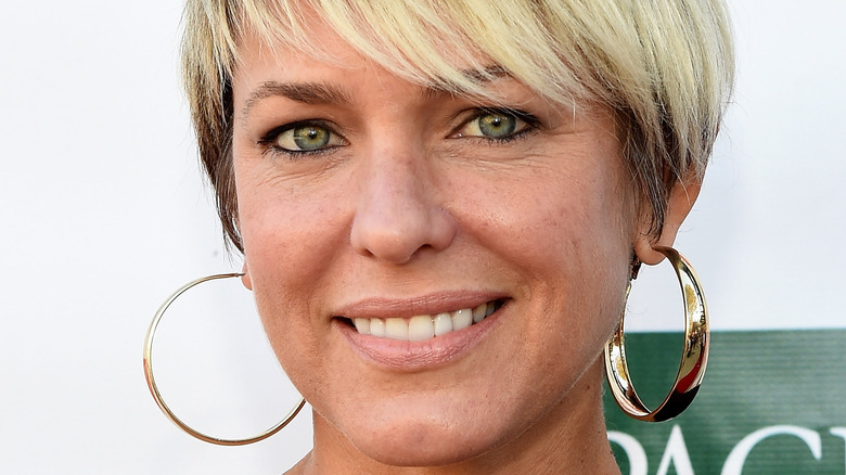 Arianne Zucker smiling on the red carpet