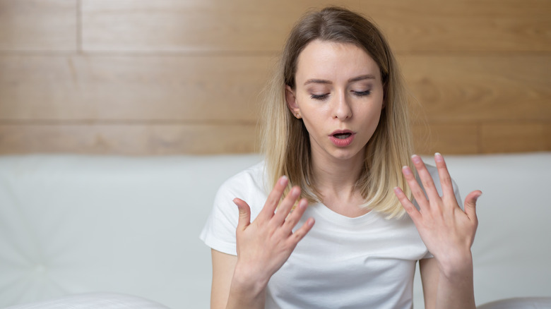 woman sweating in bed