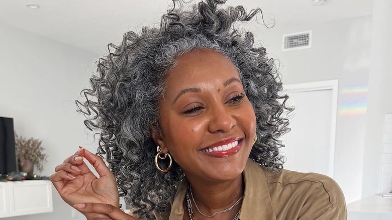 Woman with curly gray hair