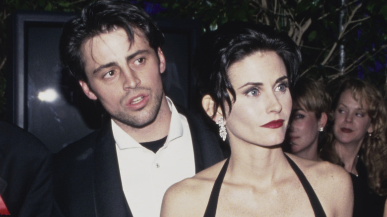 Close-up of Matt LeBlanc and Courtney Cox wearing black