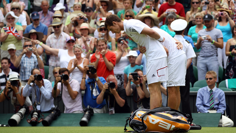 Andy Murray and Jarkko Nieminen bow to Queen Elizabeth at Wimbledon 2010